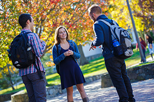 Three students chatting
