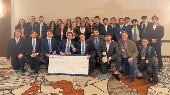 Construction Management students accept a $2,000 prize alongside their faculty advisors.