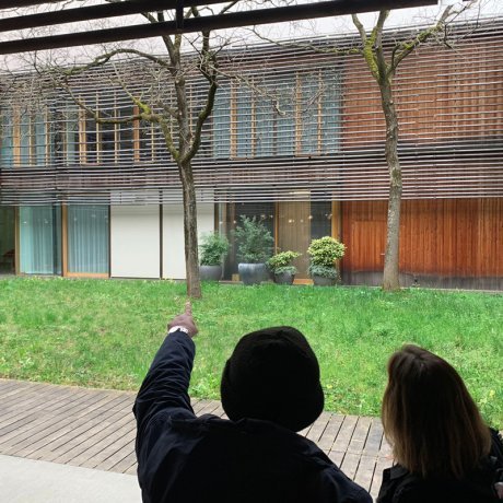 Professor Viola Ochoa and a student viewing a building in Switzerland on a Spring Break Trip