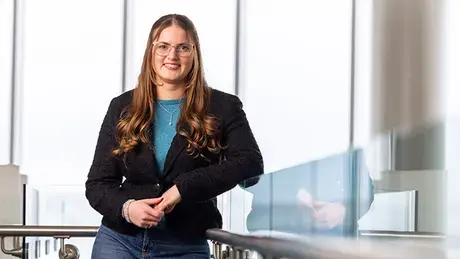Elena Sewall stands in Global Heritage Hall.