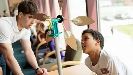 RWU student works with elementary student on a STEM project.