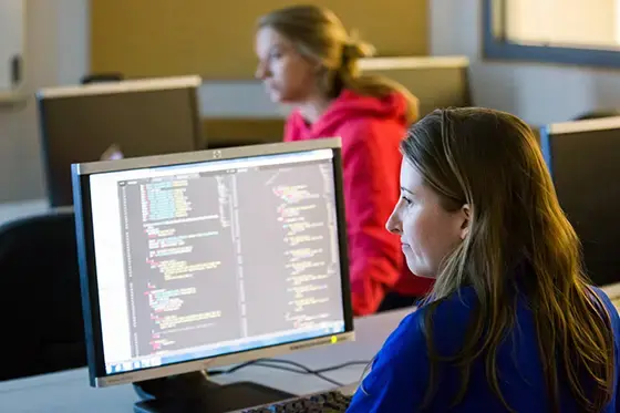 Female student at computer.