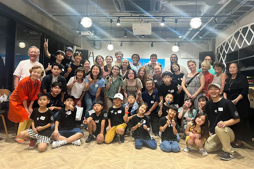 Students pose with elementary school children