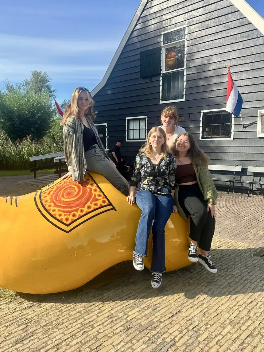 A group shot from the Netherlands featuring a large clog