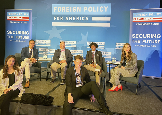 Professor Joseph Roberts and five RWU students at the Foreign Policy for America leadership summit in Washington, D.C.