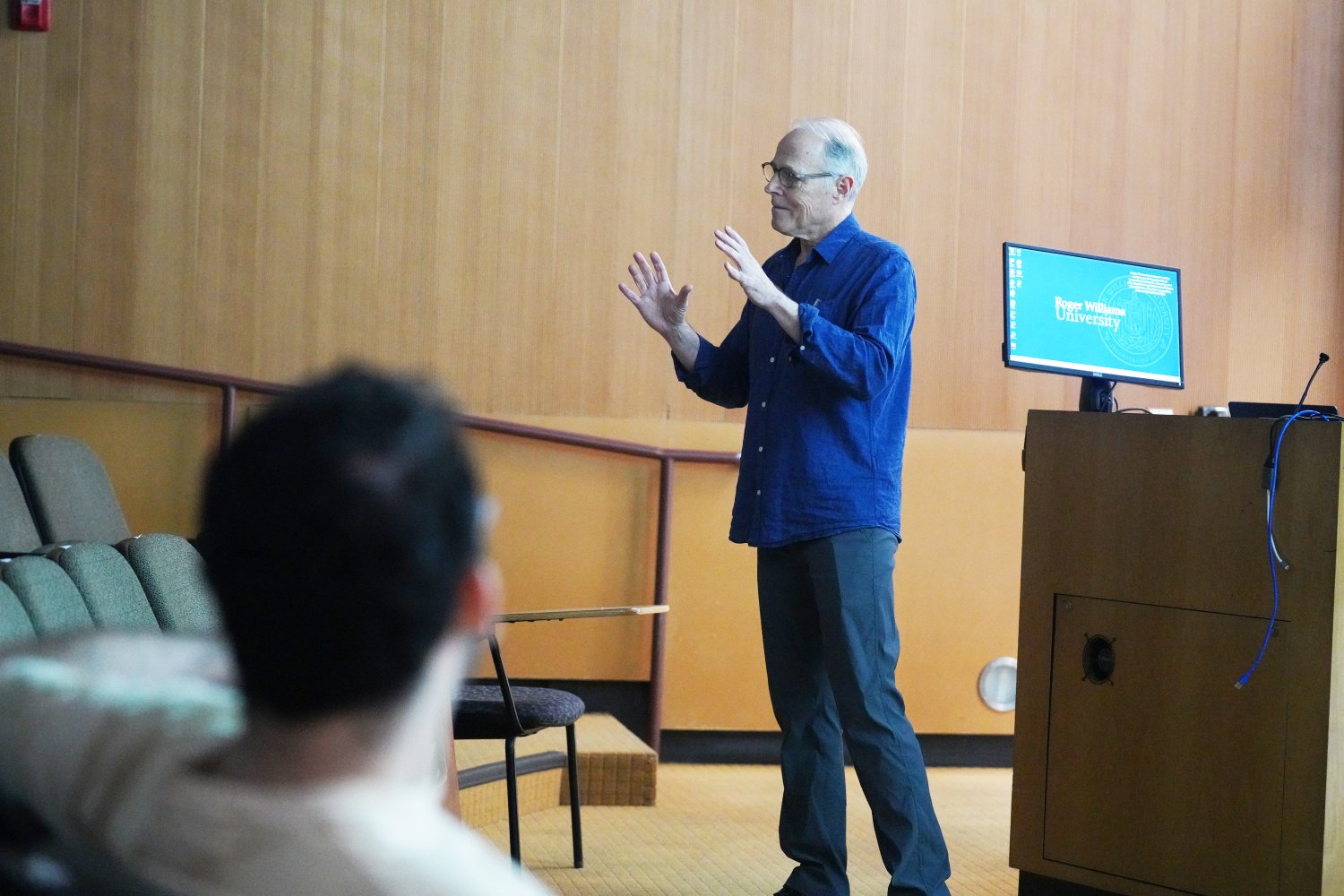 Professor Edgar Adams speaks to the class about the role of architecture in shaping city identity, using Newport, R.I., as a case study.