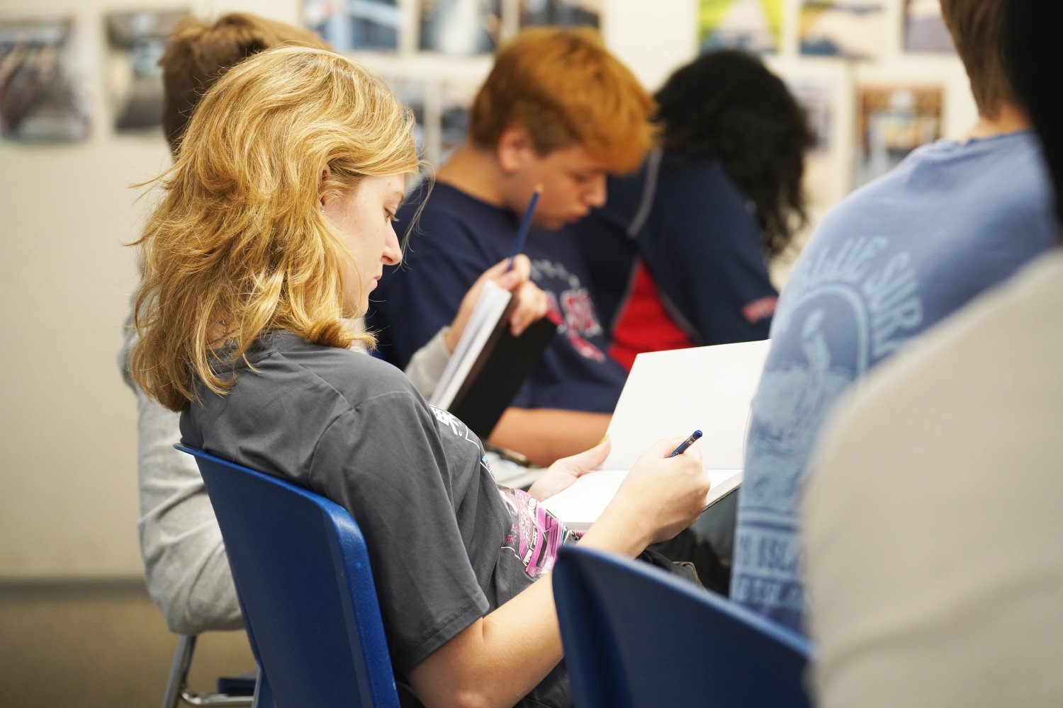 Students immerse themselves in sketching during a drawing workshop, capturing design ideas and exploring architectural concepts in their notebooks.