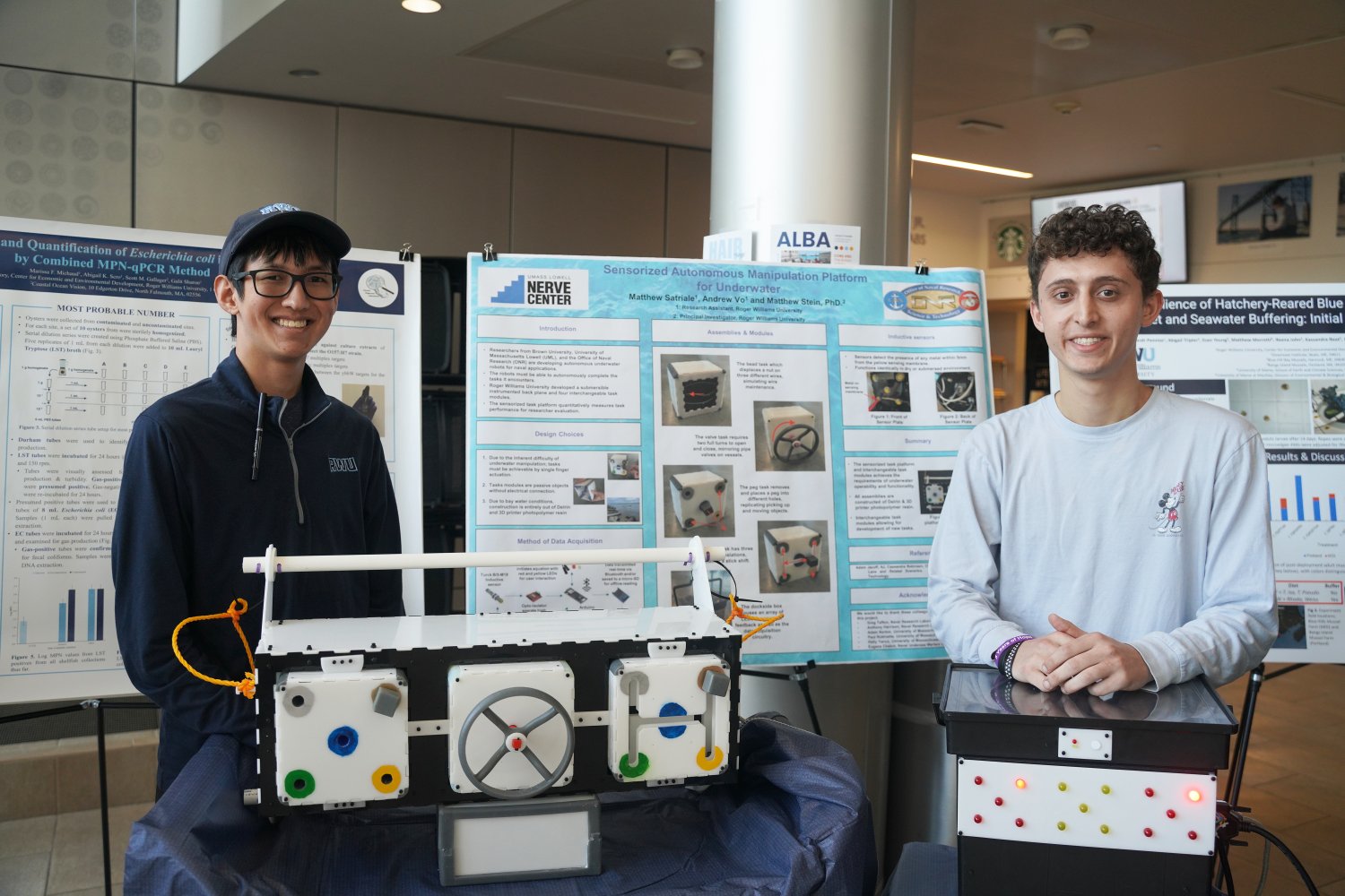 Seniors Matthew Satriale and Andrew Vo showcase their sensorized platform for underwater robots.