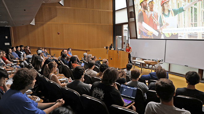 NCARB Presenter with architecture students in the Cummings School lecture hall 