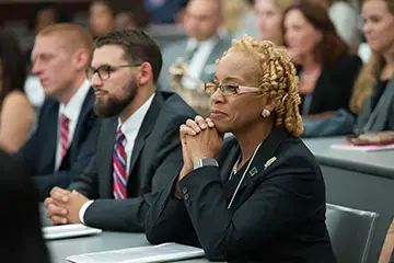 Female student at law orientation.