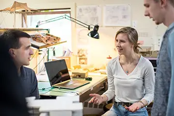 Students discussing projects.