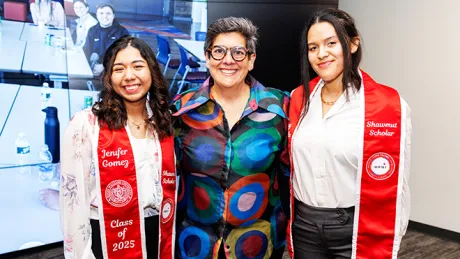 Shawmut Scholars pose with Marianne Monte of Shawmut at a scholarship reception.