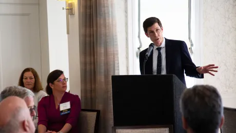 Providence Mayor Brett Smiley speaks at Roger Williams University’s inaugural Real Estate Symposium in 2023.