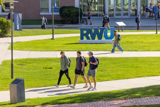 Students walking across the quad