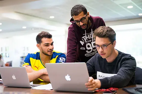 Students at computer.