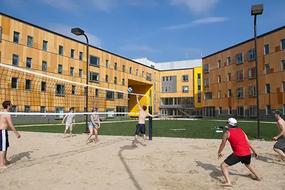 Students playing volleyball