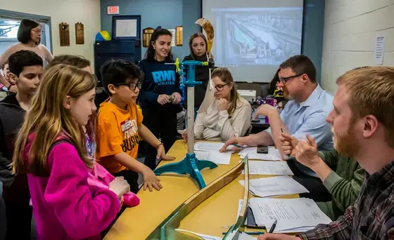 students teach 4th graders to build wind turbines