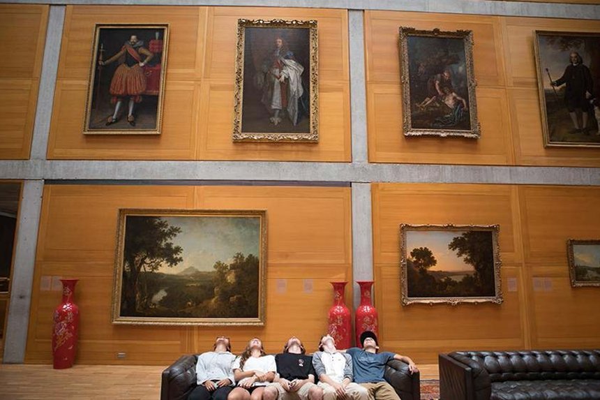 Students viewing art work at a museum