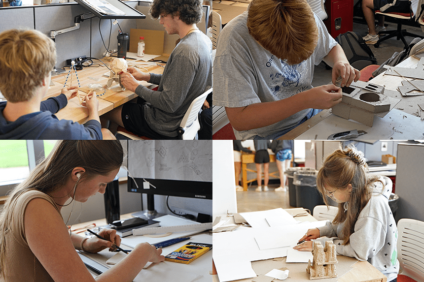 Summer Academy students working in studio on models and drawings