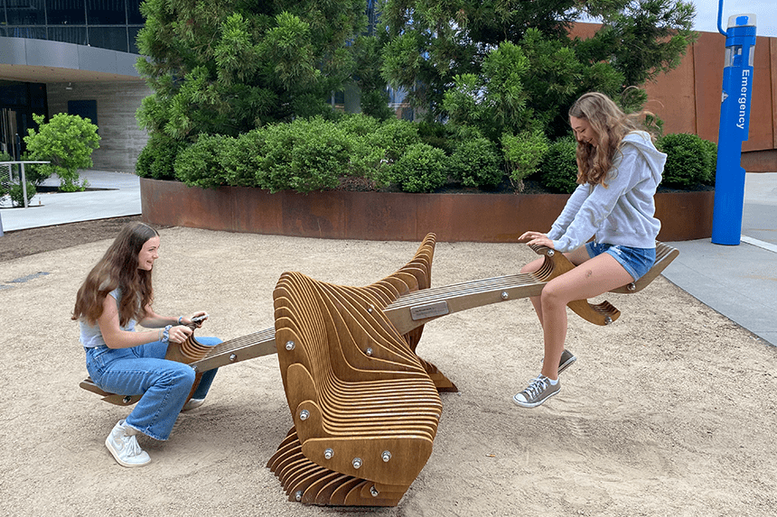 Summer Academy students on a public seesaw 