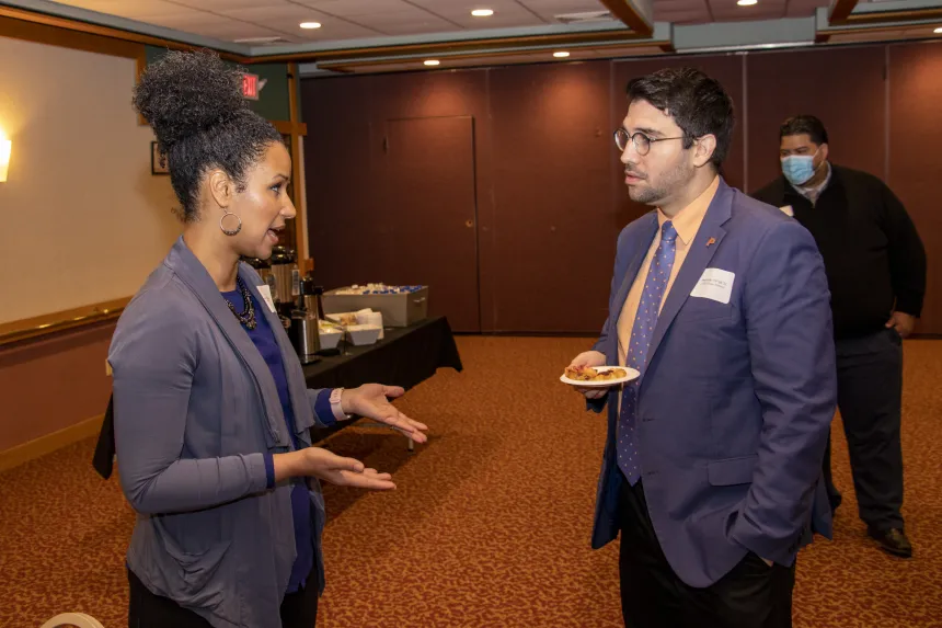 Students have a conversation at the 2022 RIASPA Conference at RWU