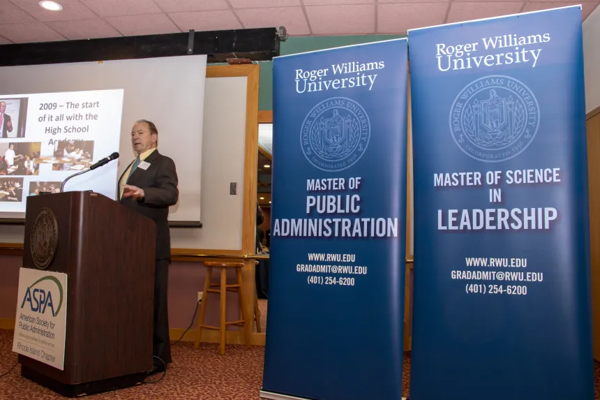 Dr. Michael Hall addresses attendees at RIASPA 2022