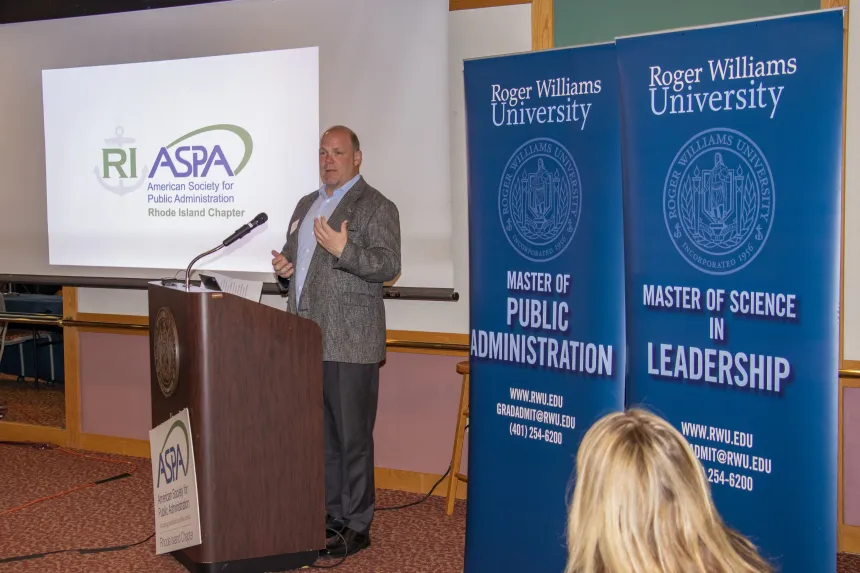 RWU School of Justice Studies Dean Eric Bronson addresses the 2022 RIASPA Conference