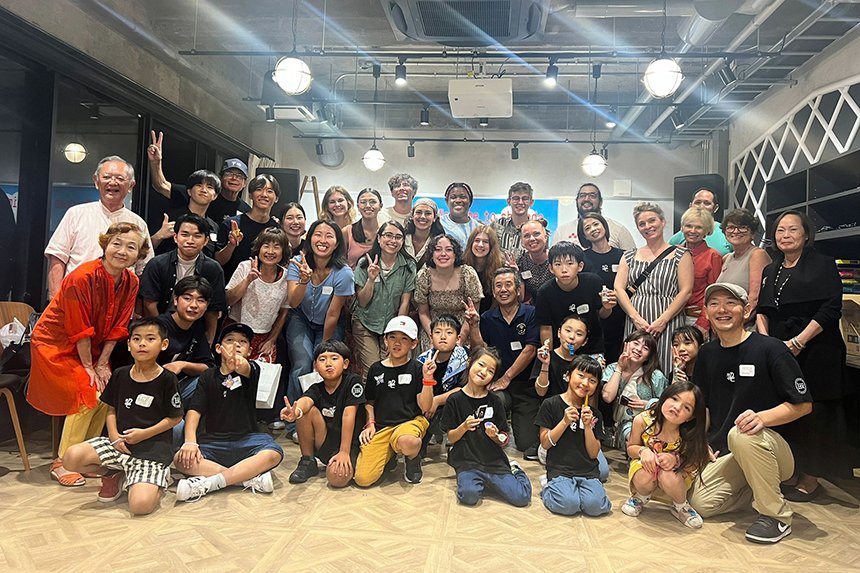 Students pose with elementary school children