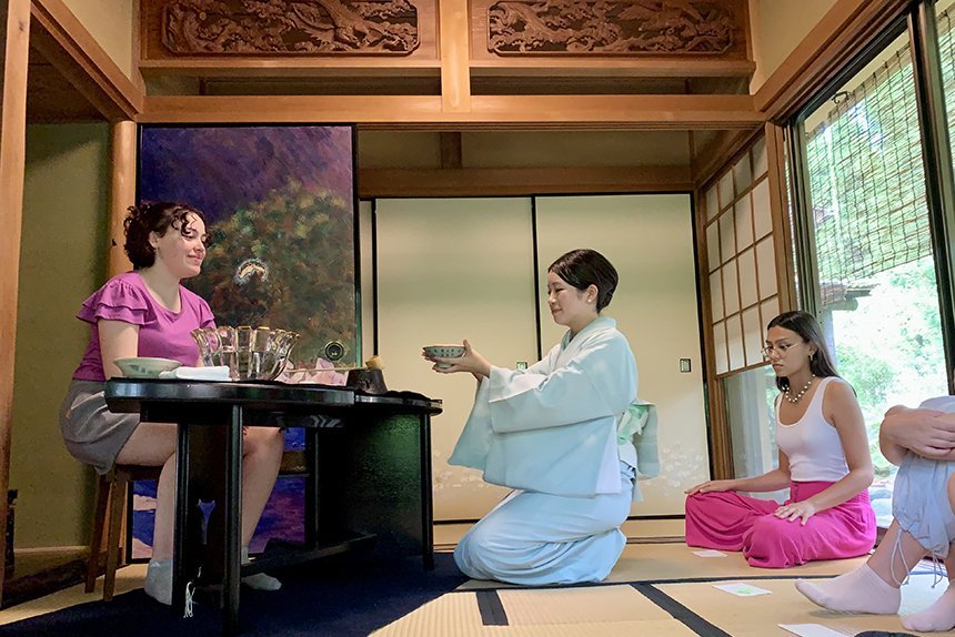 Students participate in a tea ceremony