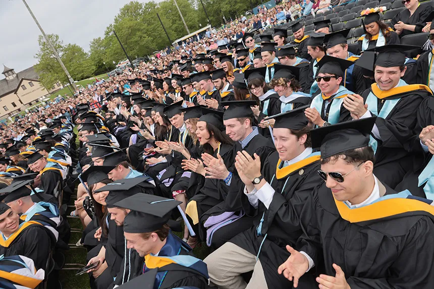 Graduates applaud speeches