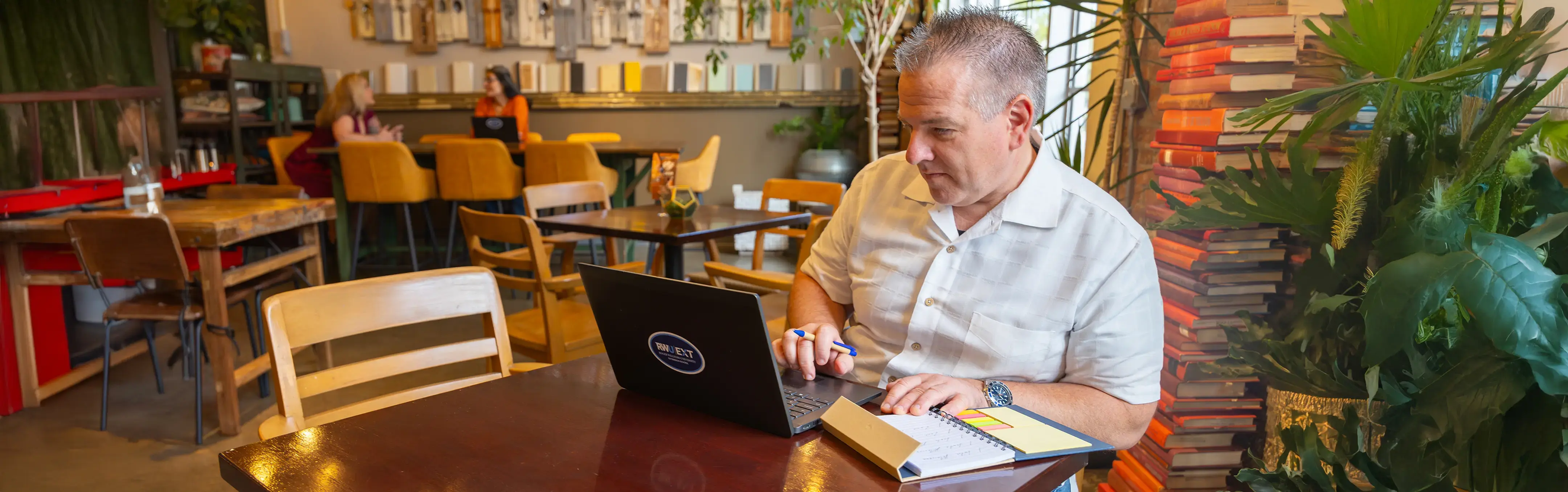 A mental health counselor works in a cafe