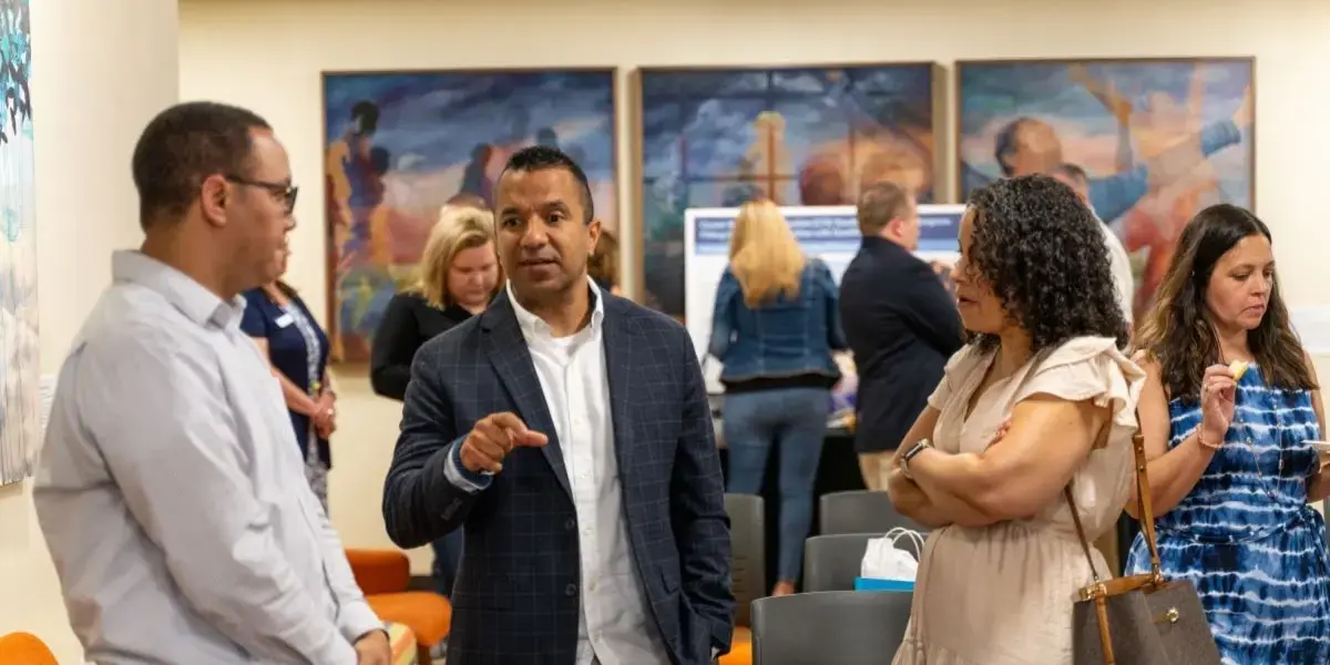 RWU EXT School Providence Campus People gathering and talking